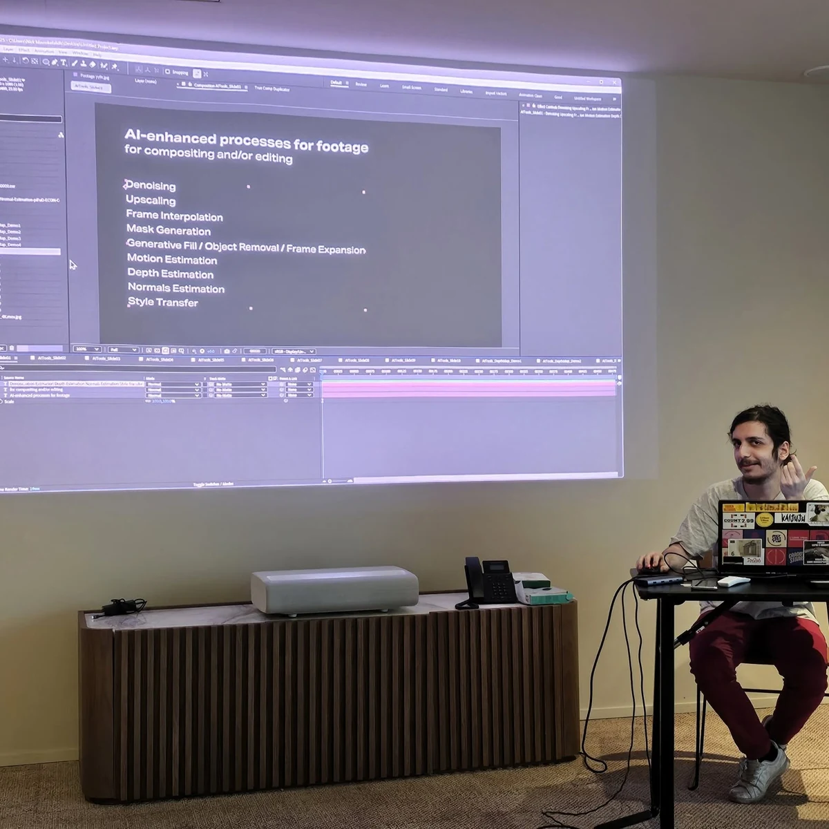 Speaker discussing AI-assisted visual production at Monasty