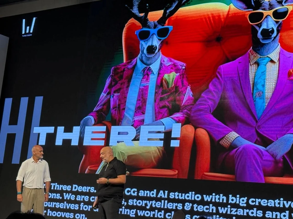 Speakers in front of THREEDEERS character artwork in Seoul